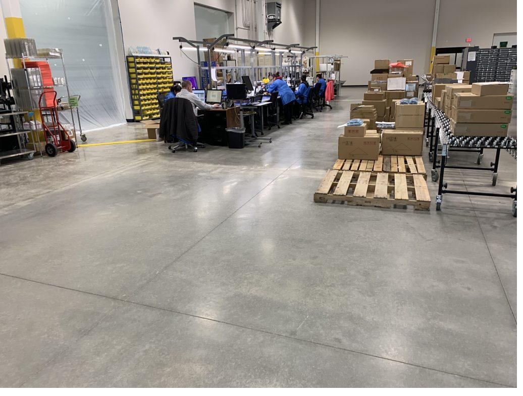 Sealed concrete floor in a fulfillment warehouse